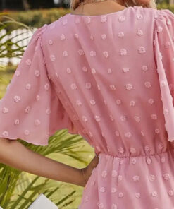 vue de dos de la Robe courte vintage rose à pois