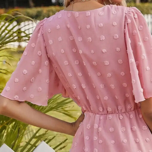 vue de dos de la Robe courte vintage rose à pois