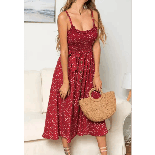 une femme avec la Robe bretelle vintage rouge à pois